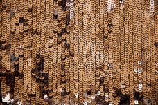 36901023-Shiny-sparkle-gold-sequins-great-for-texture-or-background-Glittering-sequins-wall-Stock-Photo.jpg